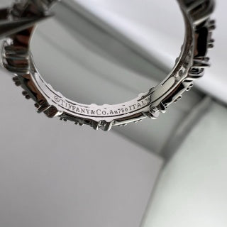 Tiffany narrow ring with three diamonds set between X-shaped motifs